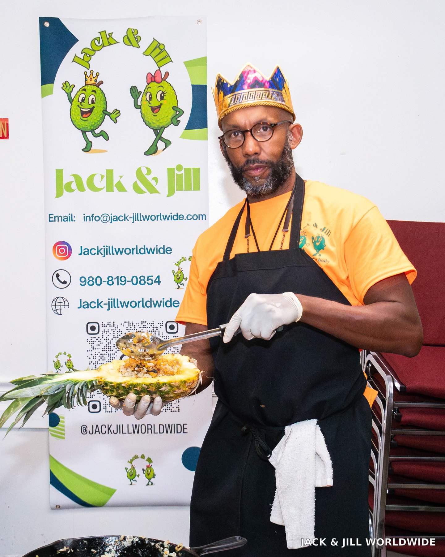 Shundo preparing jackfruit food at a Jack & Jill Worldwide table